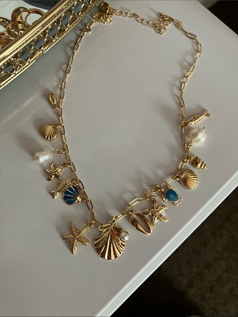 Gold Sea Charm Necklace with Blue and Pearl Accents